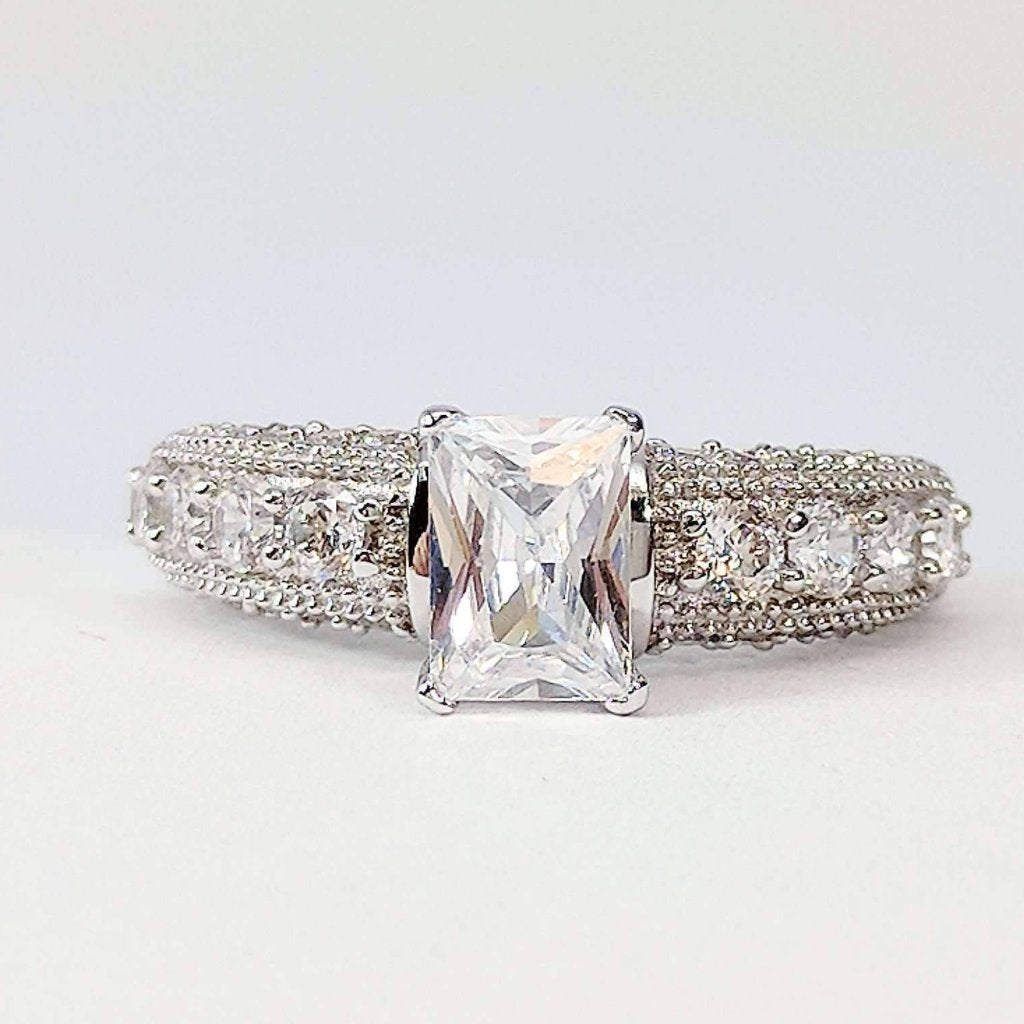 Camilla 1CT Emerald Cut Petite Pavé and Migraine Simulated Diamond Ring