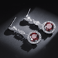 Pavé Triple Drop CZ Halo Earrings
